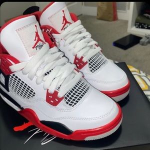 Fire red Jordan 4s size 5.5 basically brand new